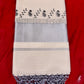 Kerala cotton saree with intricate black prints and silver border