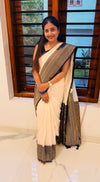 White georgette saree with navy blue border