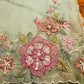 Organza blend pastel green saree with floral embroidery, pearls and sequins