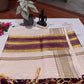 Kerala cotton saree with delicate check patterns and Maroon striped Pallu