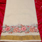 Kerala cotton saree in a classic off-white hue with floral embroidery