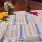 Kerala cotton saree with serene blue stripes and silver zari border