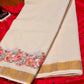 Kerala cotton saree in a classic off-white hue with floral embroidery