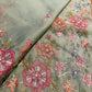 Organza blend pastel green saree with floral embroidery, pearls and sequins
