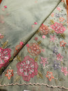 Organza blend pastel green saree with floral embroidery, pearls and sequins