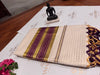 Kerala cotton saree with delicate check patterns and Maroon striped Pallu