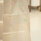 Cream Tissue Silk Saree with Floral Thread Work and Gold Zari Border
