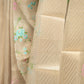 Cream Tissue Silk Saree with Floral Thread Work and Gold Zari Border