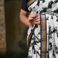 Graceful Moonga Cotton Saree with Pichwai Work in Black and White