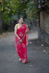 Red kota doriya saree with golden zari border and floral prints over body