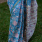 Blue Maheshwari Silk Saree with Pink & White Floral Work and Golden Zari Border
