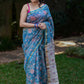 Blue Maheshwari Silk Saree with Pink & White Floral Work and Golden Zari Border