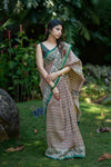 Cream Chanderi Silk Saree with Red & Black Asymmetrical Print and Green-Golden Zari Border
