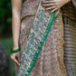 Cream Chanderi Silk Saree with Red & Black Asymmetrical Print and Green-Golden Zari Border
