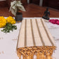 Kerala cotton saree, crafted in soft off-white with golden stripes