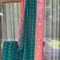 Georgette saree in green checks with contrast red banarasi border and pallo