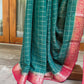 Georgette saree in green checks with contrast red banarasi border and pallo