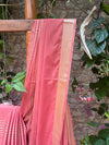 Refined crepe silk saree in a soft and graceful peach shade.